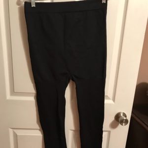 Lane Bryant leggings with lace at ankles.